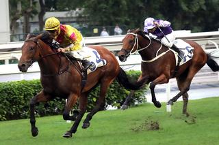 Ho Ho Khan (NZ) (Makfi) burst clear to win the Group 3 Queen Mother Memorial Cup. Photo: HKJC